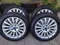 17" használt alufelni, rajta 215/55 új Continental négyévszakos gumi gumi