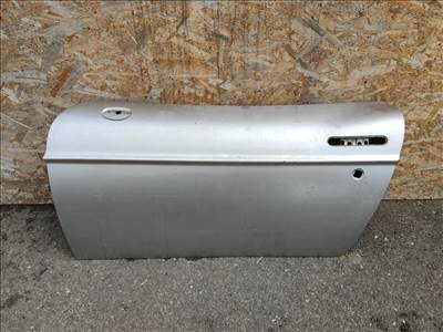 168711 Fiat Barchetta 1995-2004 ezüst színű bal oldali ajtó, a képen látható sérüléssel 51729449