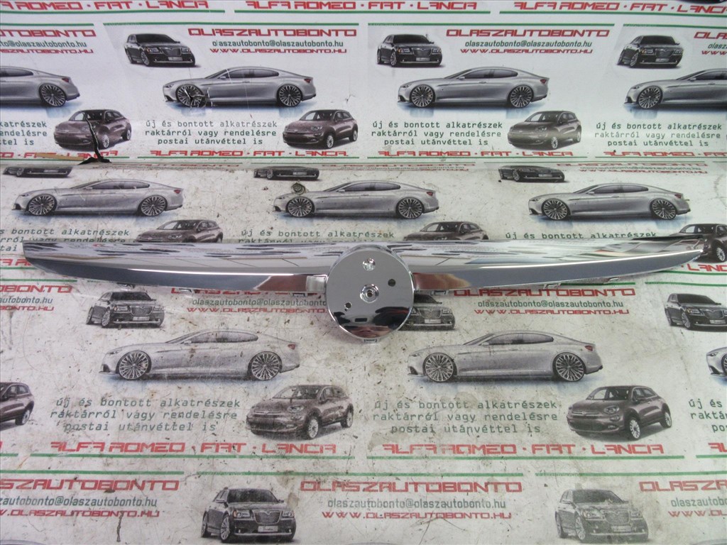 Fiat Punto Evo utángyártott új króm, első embléma tartó 735503990 1. kép