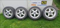 4x100 lyukosztású 15" használt Intra alufelni, rajta 195/50 használt Toyo Tires nyári gumi gumi