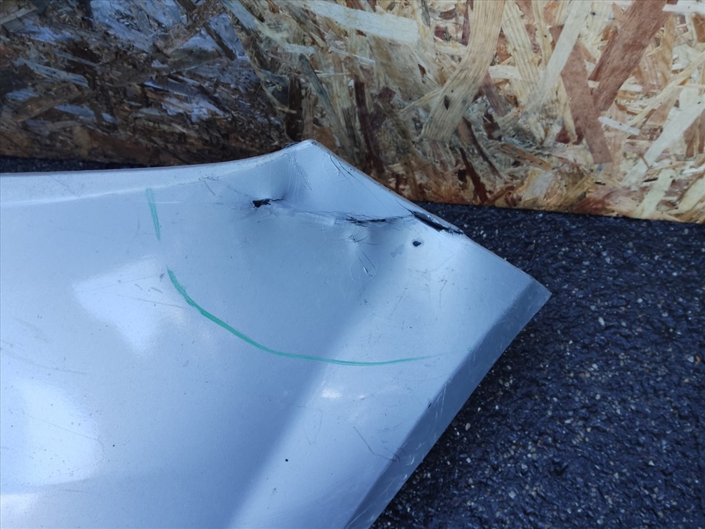 104448 Fiat Grande Punto  2005-2009 első lökhárító, a képen látható sérüléssel 735417219 2. kép