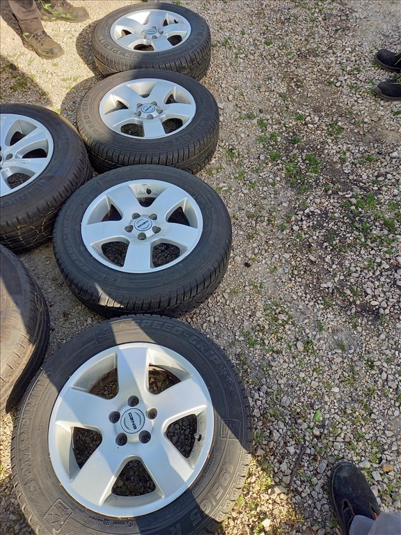  5x100 lyukosztású 15" használt Enzo alufelni, rajta 195/65 újszerű Semperit téli gumi sxx1 1. kép