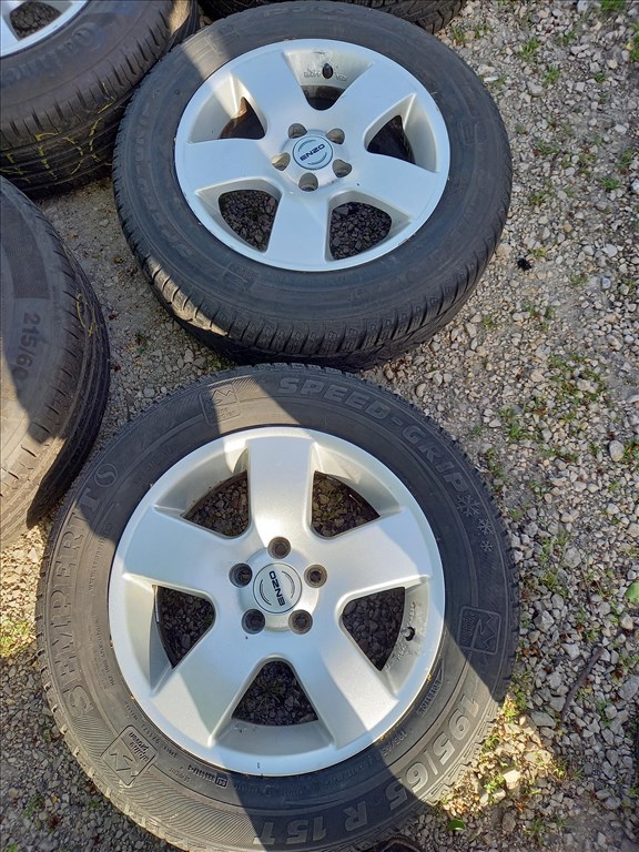  5x100 lyukosztású 15" használt Enzo alufelni, rajta 195/65 újszerű Semperit téli gumi sxx1 2. kép