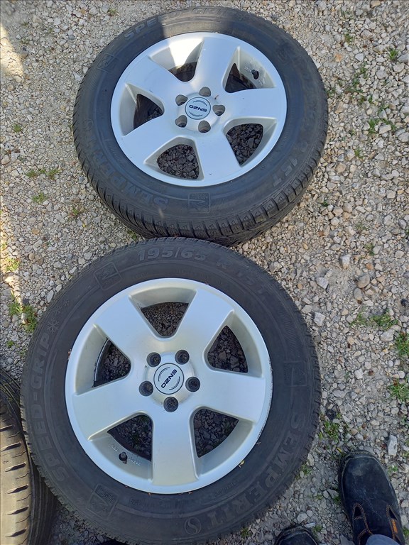  5x100 lyukosztású 15" használt Enzo alufelni, rajta 195/65 újszerű Semperit téli gumi sxx1 3. kép
