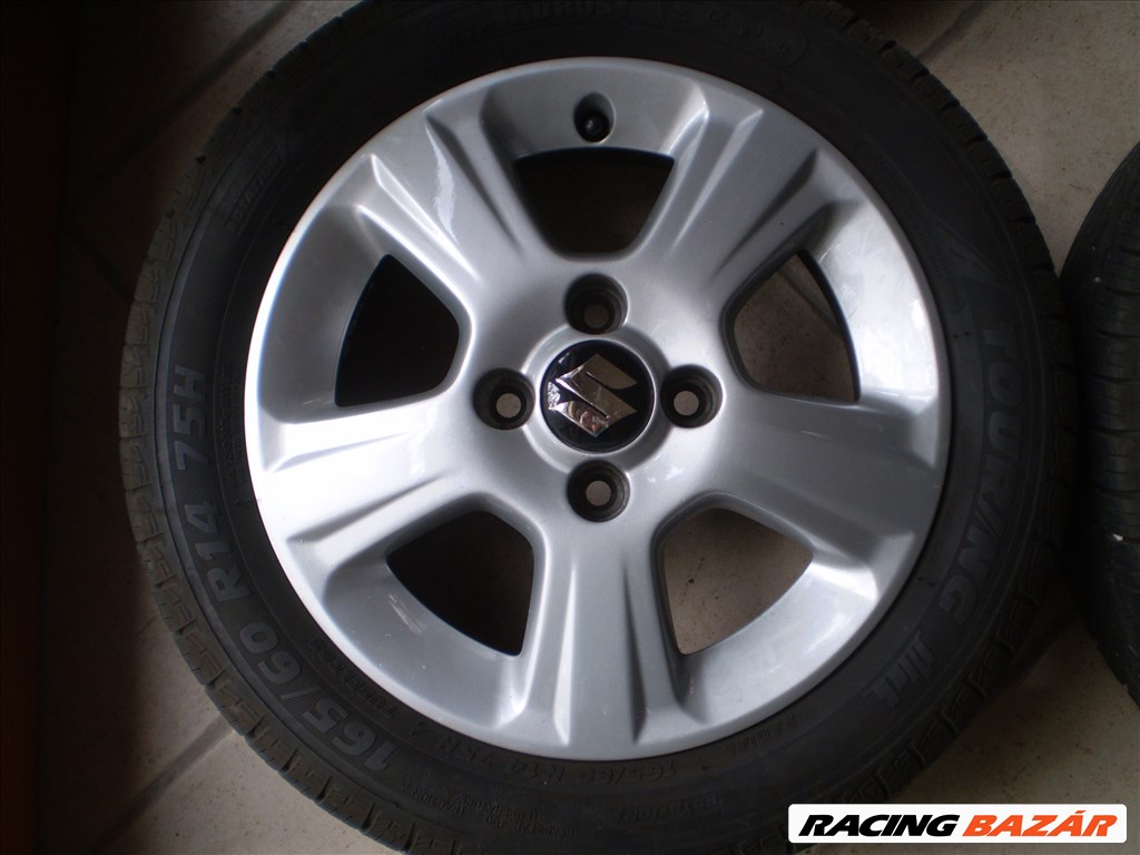  4x100 lyukosztású 14" újszerű alufelni, rajta 165/60 újszerű Taurus nyári gumi 3. kép