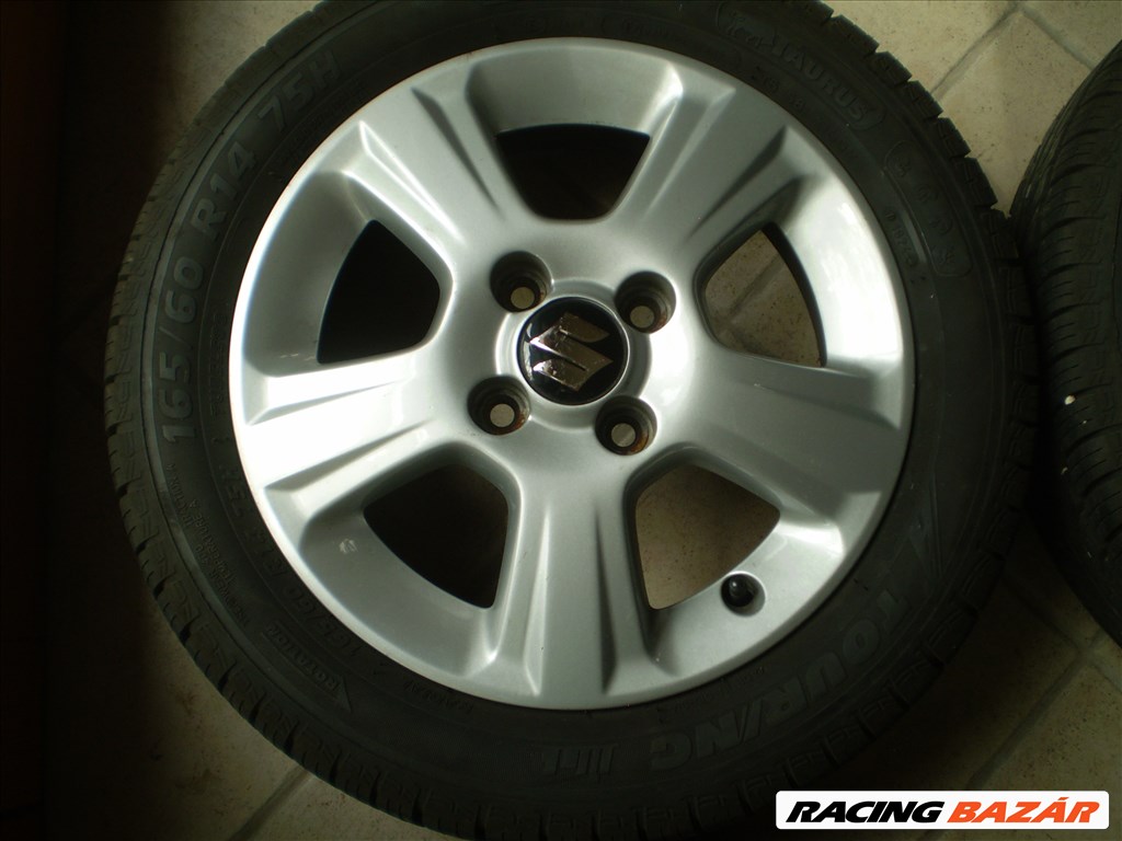  4x100 lyukosztású 14" újszerű alufelni, rajta 165/60 újszerű Taurus nyári gumi 5. kép