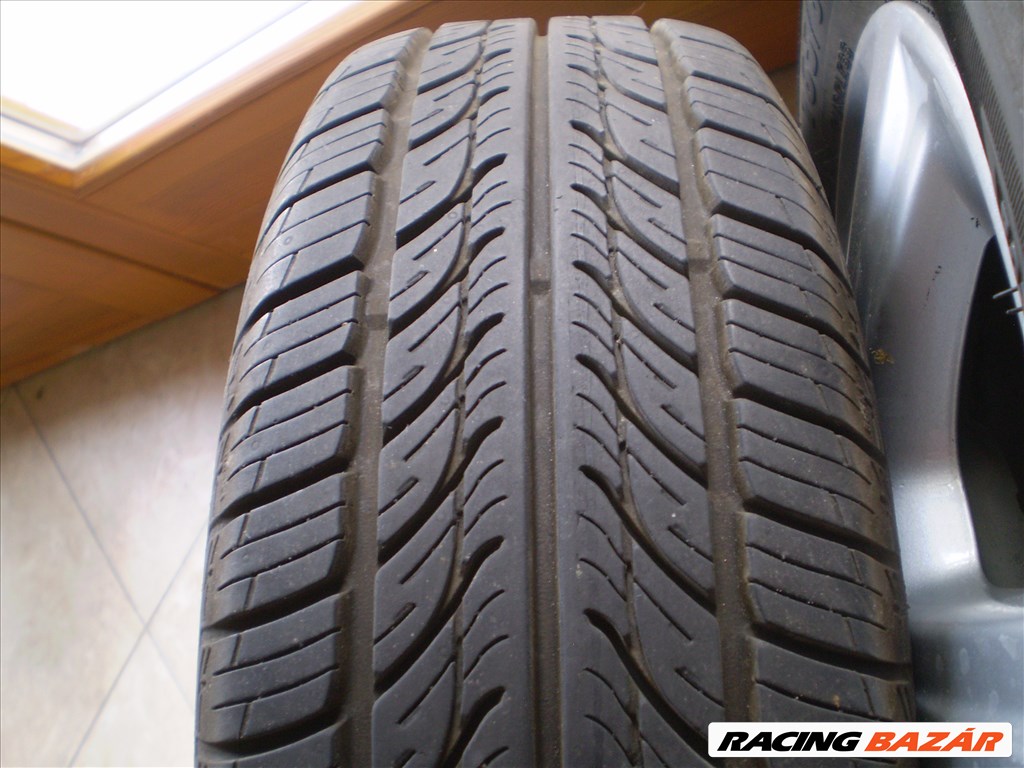  4x100 lyukosztású 14" újszerű alufelni, rajta 165/60 újszerű Taurus nyári gumi 7. kép