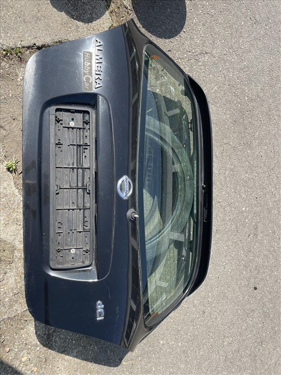 Nissan Almera II Csomagtérajtó rozsdamentes 1. kép