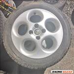 Alfa Romeo 15" használt alufelni, rajta 185/55 eldobós téli gumi