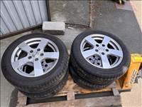 5x114.3 lyukosztású 16" újszerű Dezent alufelni, rajta 205/55 használt Goodyear nyári gumi gumi