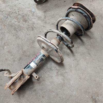 TOYOTA COROLLA AE/EE 92.05-97.04 Bal első lengéscsillapító rugóval