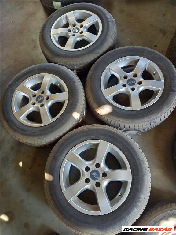  Opel 5x110-as 7x15" újszerű PLW alufelni, 205/65R15 használt Michelin nyári gumi sxx2 1. kép