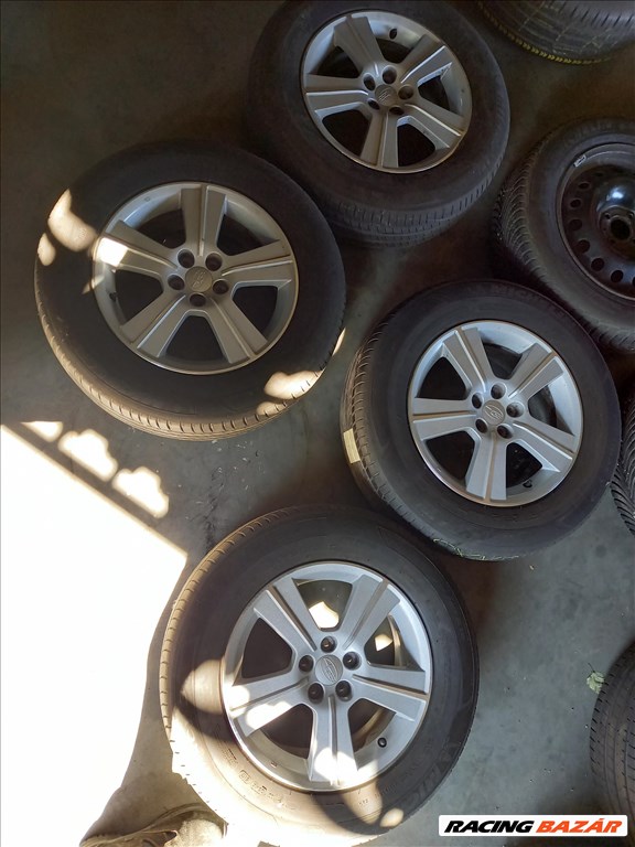  Subaru Forester 5x100-as  6.5x16" (gyári felni) alufelni, 215/65 használt Michelin nyári gumi sxx2 1. kép