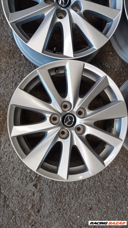  5x114.3 lyukosztású 7JJ 17" használt (gyári felni) alufelni 2. kép
