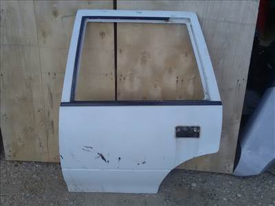 SUZUKI SWIFT 96-05 Bal hátsó ajtó.