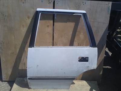 SUZUKI SWIFT 96-05 Bal hátsó ajtó.