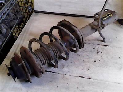 SUZUKI SWIFT 96-05 Bal első lengéscsillapító rugóval