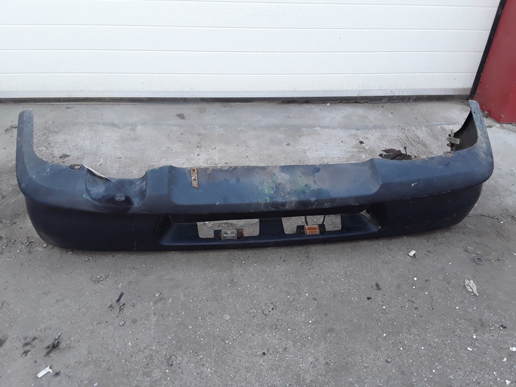 SUZUKI SWIFT 96-05 Hátsó lökhárító alsó műanyag elem 1. kép