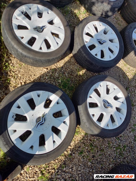 Citroen C4 Cupe 4x108-as 16.5x7" fehér (gyári felni) alufelni, 205/50R17 Continental nyári gumi sxx2 1. kép