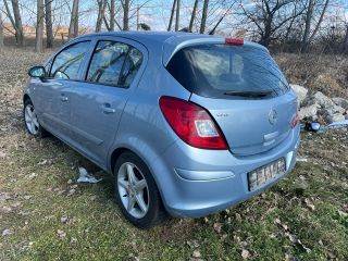 OPEL CORSA D Bal hátsó Rugó