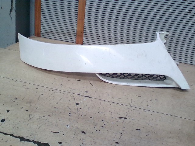 CHEVROLET Tacuma 02-08 Jobb fényszóró alatti bajusz díszléc 1. kép