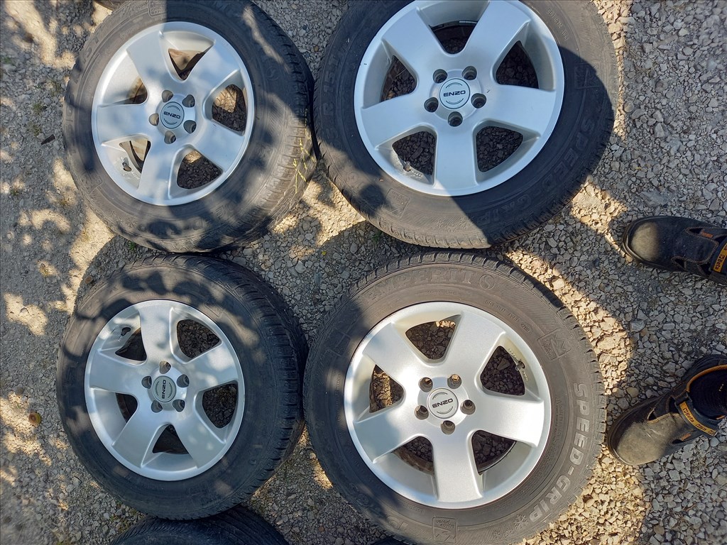  5x100 lyukosztású 15" használt Enzo alufelni, rajta 195/65 használt Semperit téli gumi sxx1 1. kép