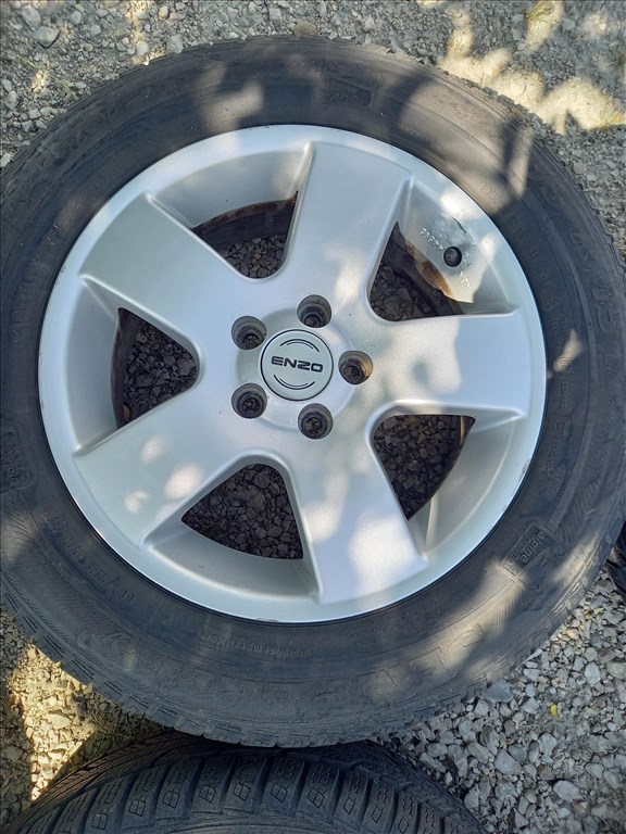  5x100 lyukosztású 15" használt Enzo alufelni, rajta 195/65 használt Semperit téli gumi sxx1 3. kép