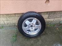  5x112 lyukosztású 15" újszerű Gyári alufelni, rajta 215/60 újszerű Dunlop nyári gumi gumi 