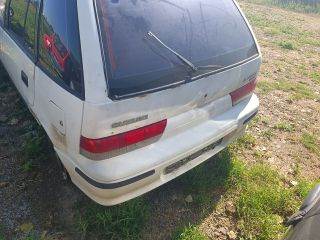 SUZUKI SWIFT II Ferdehátú (EA, MA) Bal hátsó Külső Kilincs