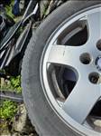  5x100 lyukosztású 14" használt felni, rajta 185/60 újszerű Toyo Tires gumi 