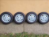 4x100 lyukosztású 14" újszerű (gyári felni) alufelni, rajta 185/65 új Toyo Tires nyári gumi gumi