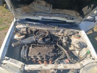 SUZUKI SWIFT II Ferdehátú (EA, MA) Jobb első Dobbetét (Kerékjárati, Műanyag) 4. kép