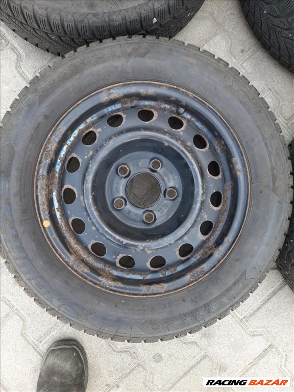 5x114.3 lyukosztású 15" használt (gyári felni) lemezfelni, rajta 185/65 használt téli gumi sxx4 2. kép