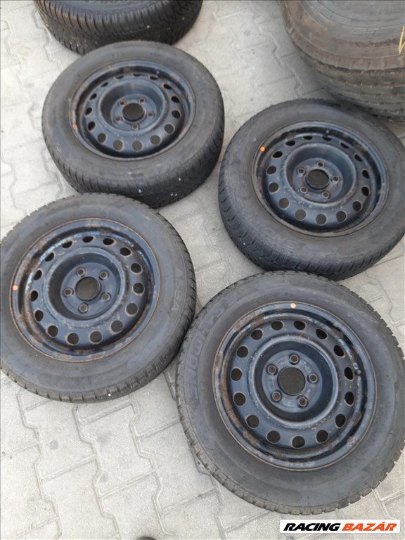 5x114.3 lyukosztású 15" használt (gyári felni) lemezfelni, rajta 185/65 használt téli gumi sxx4 1. kép