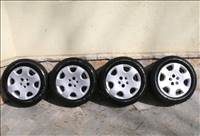 5x100 lemezfelni 15”, 185/65 használt Fulda nyári gumi gumi, Chrysler Pt Cruiser dísztárcsával.