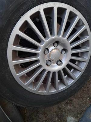  15" gyári Alfa használt felni, rajta használt gumi 