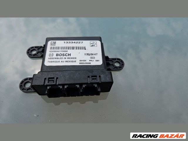 Opel Astra J Tolatóradar elektronika  13334227 1. kép