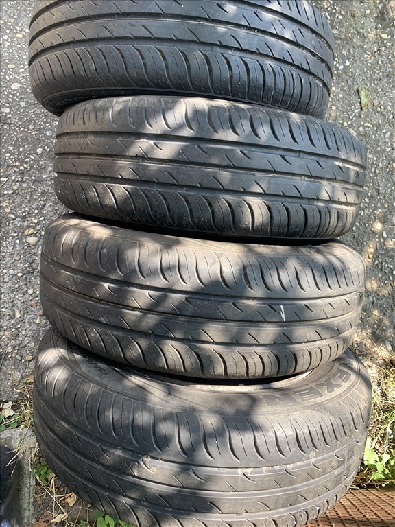  4x108 lyukosztású 15" használt  lemezfelni, rajta 185/65 újszerű Nexen nyári gumi   1. kép