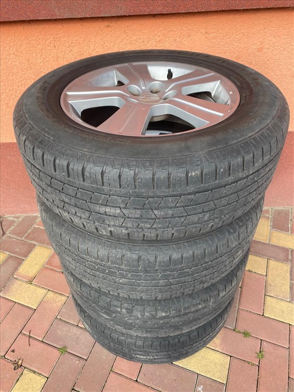  5x100 lyukosztású 16" használt Subaru alufelnik, rajtuk 215/65 használt Continental nyári gumik 7. kép