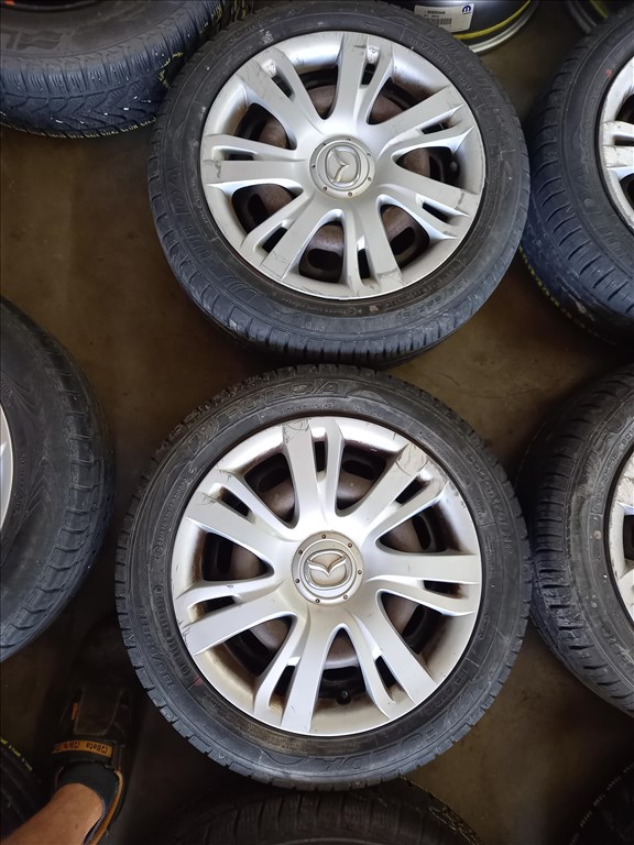  Mazda 4x100-as 6x15" használt (gyári felni) lemezfelni 185/55 újszerű Fulda nyári gumi sxx3 2. kép