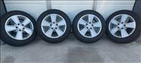  Vw 5x112 lyukosztású 16" használt alufelni, rajta 195/60 16 Continental négyévszakos gumi .