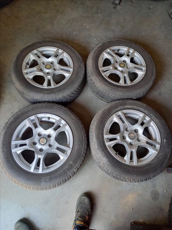  5x114.3-as 6.5x15" használt Platin alufelni, rajta 195/65R15 használt Continental téli gumi sxx4 1. kép
