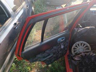 SUZUKI SWIFT II Ferdehátú (EA, MA) Bal hátsó Ajtó Kárpit