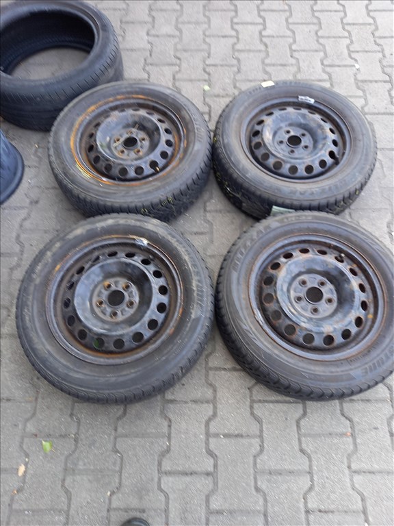  Toyota 5x100-as 5.5x15" használt (gyári felni) lemezfelni 185/65 újszerű Bridgestone téli gumi sxx1 1. kép