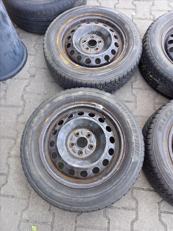  Toyota 5x100-as 5.5x15" használt (gyári felni) lemezfelni 185/65 újszerű Bridgestone téli gumi sxx1 2. kép