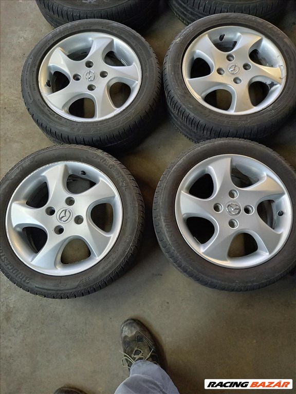 Mazda2 4x108-as 6x15" újszerű (gyári felni) alufelni, 195/50 újszerű Falken nyári gumi sxx3  1. kép