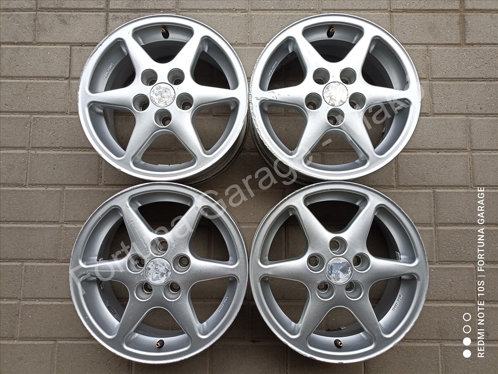 5x100 14" Titan használt alufelni garnitúra 1. kép