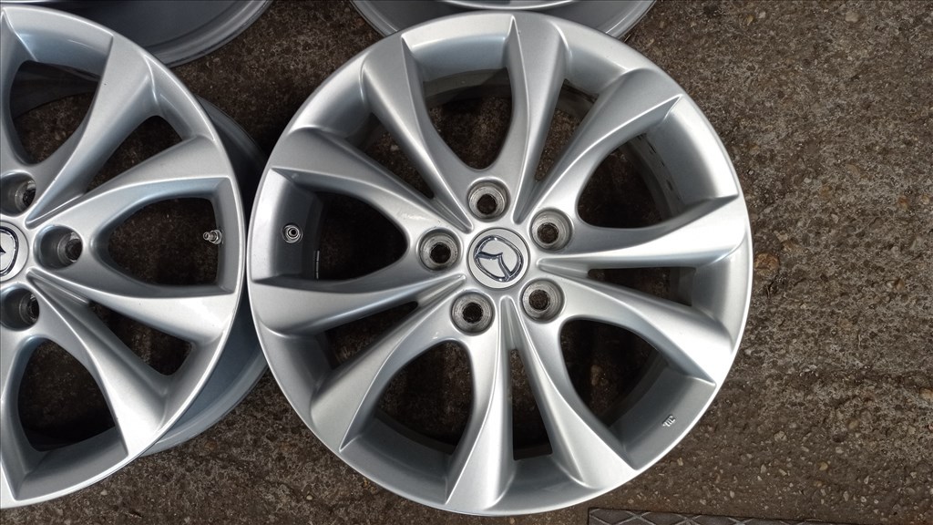  5x114.3 lyukosztású 7JJ 17" használt (gyári felni) alufelni 2. kép