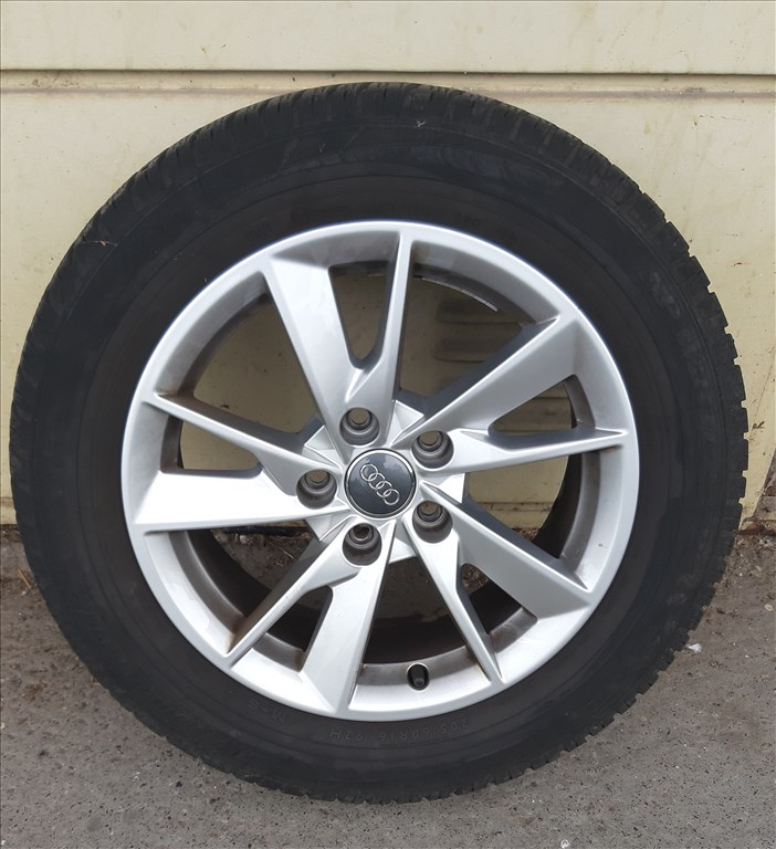  16" használt (gyári felni) alufelni, rajta 205/60 használt Dunlop téli gumi gumi  1. kép