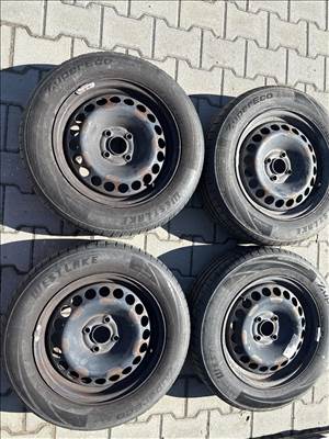 Opel Corsa d/e 4x100 lyukosztású 15" használt gyári felni lemezfelni,rajta 185/65 nyári gumi